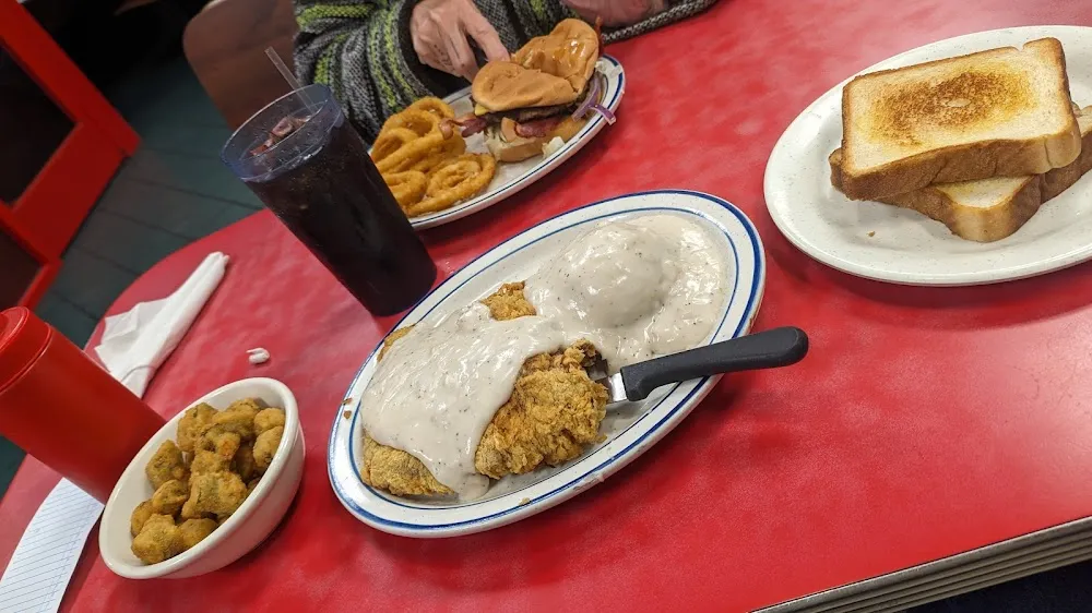 Chicken Fried Steak Mashed Potatoes with Gravy over All Okra and Texas Toast on the Side